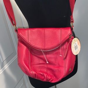 Red shoulder bag by the Sak
